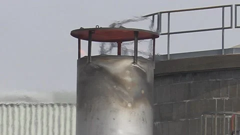 Climate change , carbon emissions flames and gasses from industrial smokestack Stock Footage 151238468