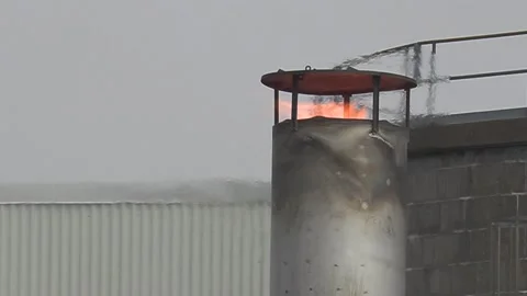 Climate change , carbon emissions flames and gasses from industrial smokestack Video stock 151238517