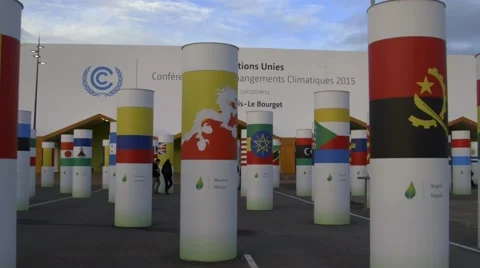Climate Change COP21 conference Paris - track in to entrance exterior Stock Footage