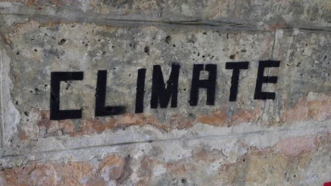 Climate Change Equals Human Extinction graffiti under a bridge. Stock Footage 113783366