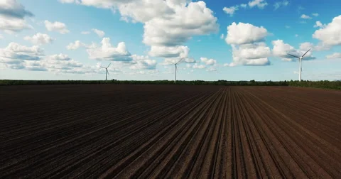 Climate change: flying up to see Wind mills - renewable energy  Stock Footage 65125687