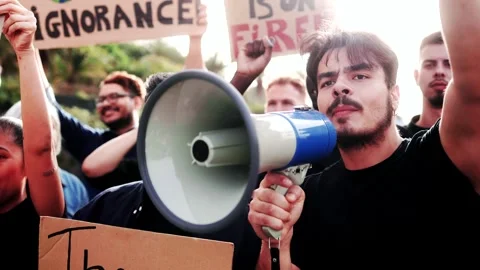 Climate change group of activists protest for global warming in the city. Green Stock Footage 256835822