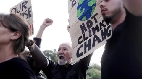 Climate change group of activists protest for global warming in the city, Green  Stock Footage 290931330
