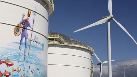 Climate change heaven and hell, an oil terminal in Amsterdam, Netherlands, wi 動画素材 235738741