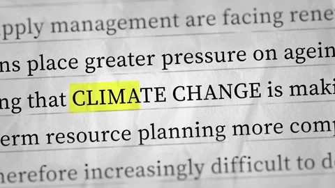 Climate Change Highlighted in Yellow on Simulated Article Text Stock Footage 343661330