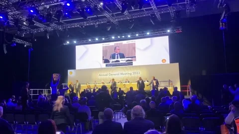 Climate change protesters try to storm stage at Shell AGM Stock Footage 241910838