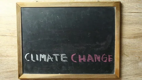 Climate change word with copy space on black board, in studio Chiangmai Thailand Stock Footage 169572181