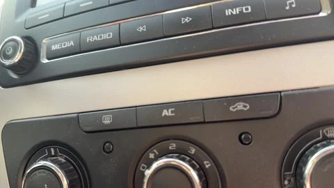 Climate control knob rotates to change the cabin fan speed, airflow strength Stockbeeldmateriaal 337115035