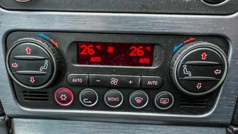 Climate control panel inside automobile. Car salon temperature. Equipment in Stock Photos