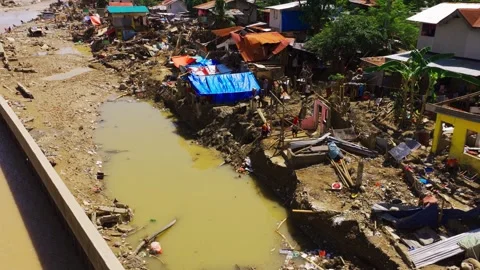 Climate disaster hits vulnerable river community in Cebu Philippines Stock-Footage 328630189