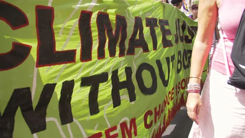 Climate Justice Flag in a March  Stock Footage 132105902