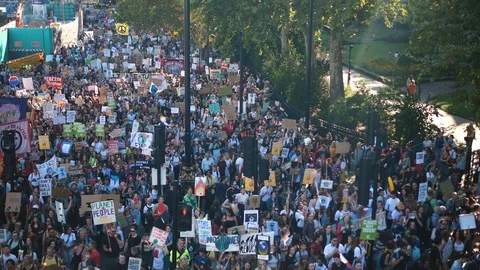  Climate Marching Group Protesters Large crowd with Banners from Above 動画素材 116398484