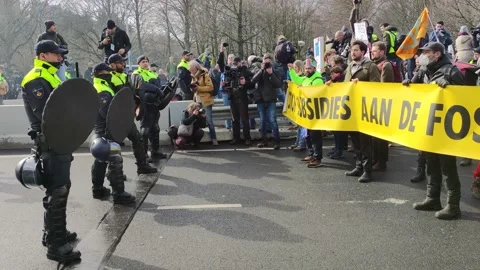 Climate protest and road blockade in The Hague, Extinction Rebellion movement Stock Footage 235902765