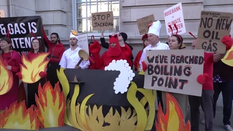 Climate protestors stage demonstration in London against new North Sea oil and  Stock Footage 345653486