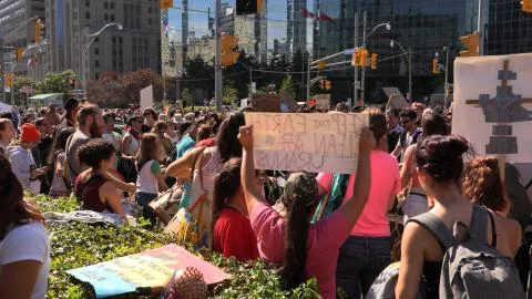 Climate strike march with thousands of young students protesting climate change Stock Photos