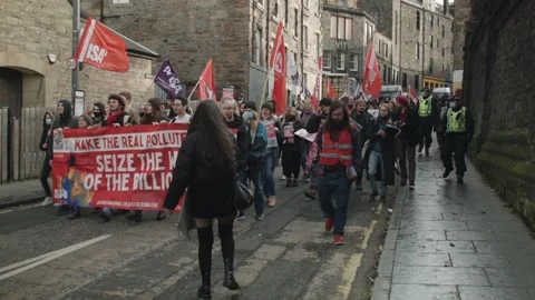 Climate Strike Marching Down Road Chanting Stock Footage 164548614