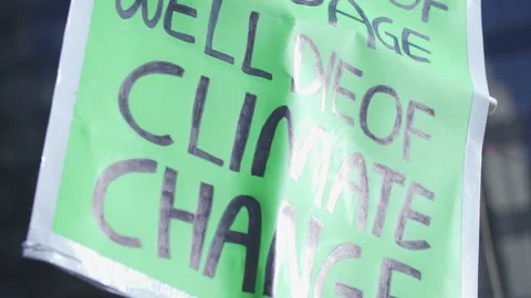 Climate Strike Protest Close Up of Sign People Cheering Stock Footage 139249606