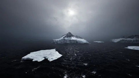 Climate survey perspective over black ocean and melting floes Stock Footage 331520818