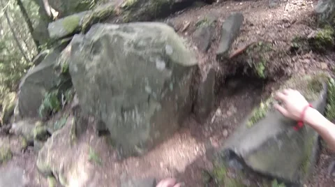 Climb the rocks on top of the mountain Stock Footage 68189488