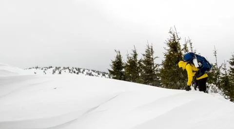 Climb to the top of the mountain. Stock Photos
