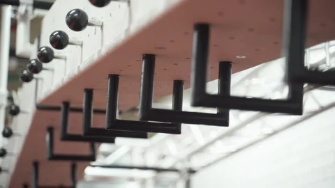 Climb training monkey bars in a ninja warrior gym. Close up Handheld Stock Footage 124300105