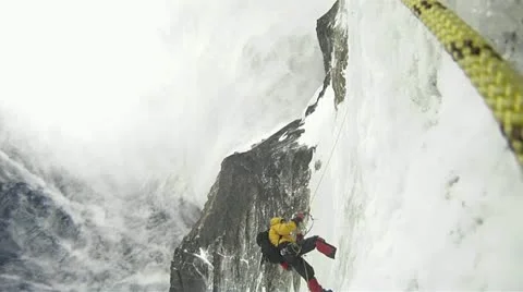 Climber ascends into strong winds Stock Footage 22173971