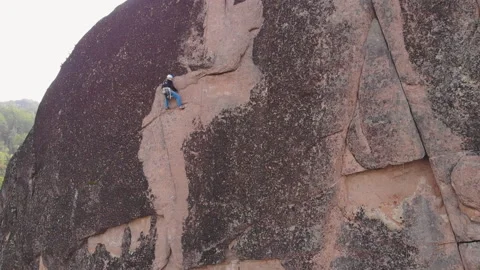 Climber breaks down and falls down hanging on the safety net. Stock Footage 131371386