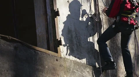 Climber builder renovating the old structure. Stock Footage 67826660