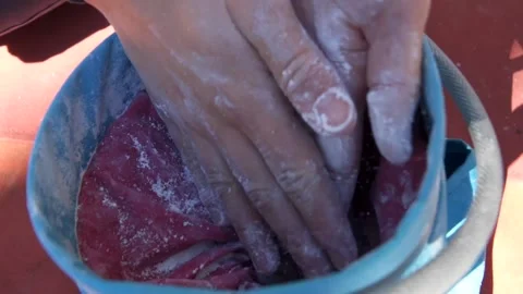 Climber chalking up hands Stock Footage 149521041