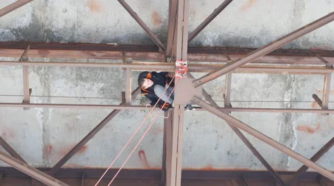 Climber checks the reliability of fixed ropes Stock Footage 60440060