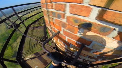 Climber climbed to the top platform pipe Stock Footage 42417648