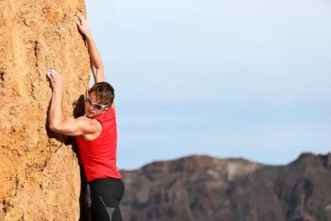 Climber climbing Stock Photos