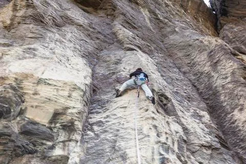 Climber climbing Stock Photos