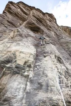 Climber climbing Stock Photos