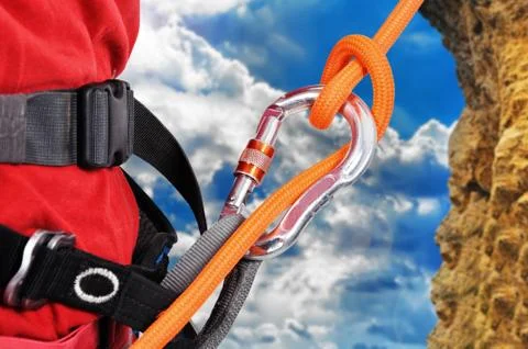 Climber climbing a rope Foto stock