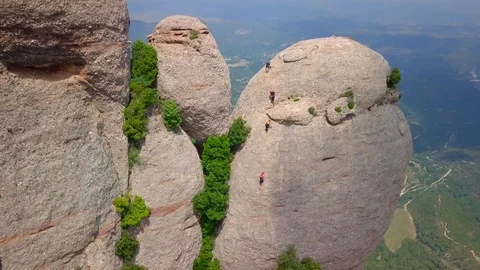 Climber climbs the wall of Mount Montserrat in Spain. Stock Footage 129562832