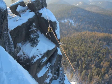 Climber crossing the gorge Stock Footage 83673399
