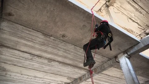 Climber descending closeup Stock Footage 76316044