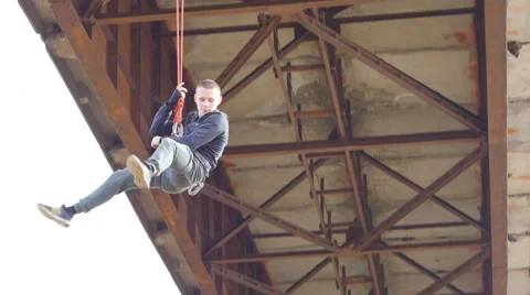 Climber descends gently on the rope Stock Footage 60443198
