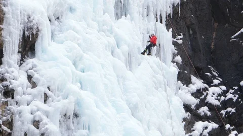 Climber descends from the icefall on the rope Stock-Footage 88198904