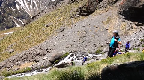 Climber down after rest. Motivation. Mountain Stock Footage 69065136