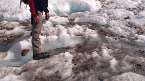 Climber Drinking water at glacier Stock Footage 40715675