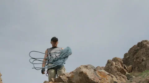 Climber extends a helping hand to his companion Video stock 62389649