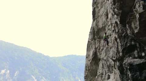 Climber falls of difficult steep route Stock Footage 43810528