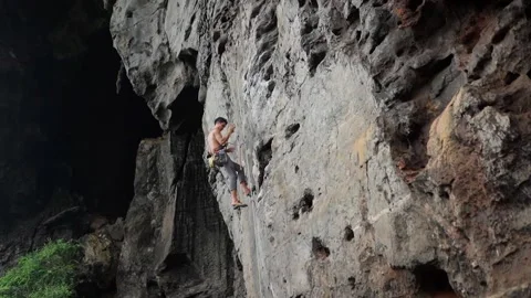 Climber finishing climb Stock Footage 146225408