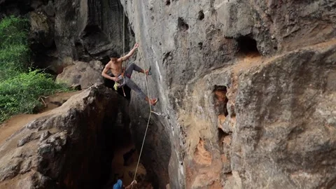 Climber finishing climb Stock Footage 146225509