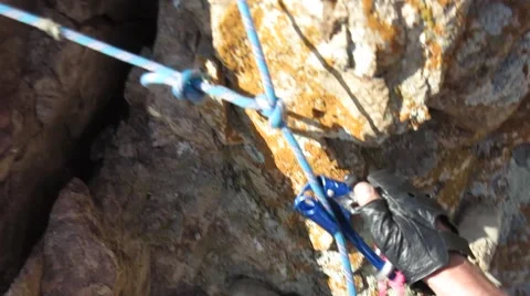 Climber goes down from the rock Stock Footage 63214001