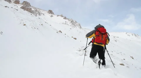 Climber goes on mountain trail Stock Footage 35543162