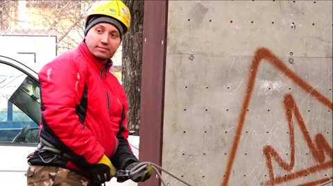 Climber helps his partner to climb on an imaginary mountain. Stock Footage 69028900