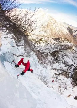 Climber on a ice fall Stock-Fotos